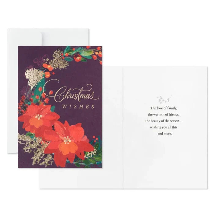 Christmas card with floral design and 'Christmas Wishes' text on a white background