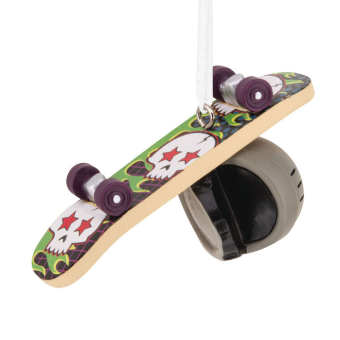 Skateboard-shaped toy with colorful design on a white background