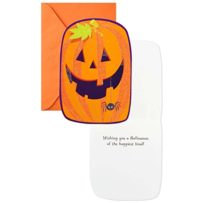 Halloween-themed greeting card with a jack-o'-lantern design on an orange envelope.