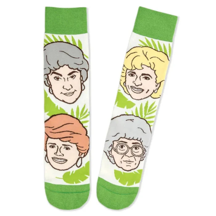 Pair of socks with illustrations of four people's faces Rose, Sophia, Blanch and Dorothy on a white background
