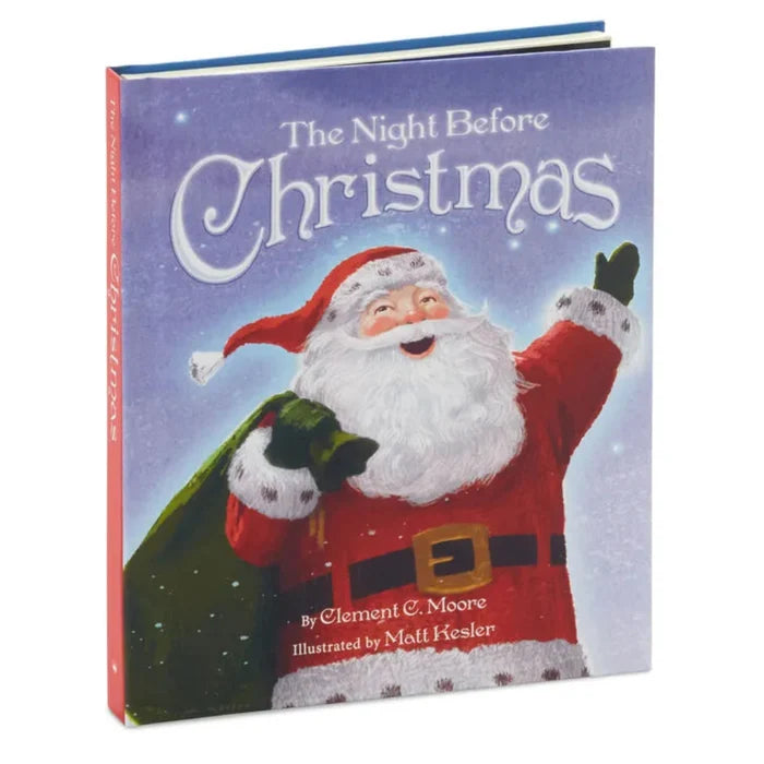 Book titled 'The Night Before Christmas' with a illustration of Santa Claus on the cover.