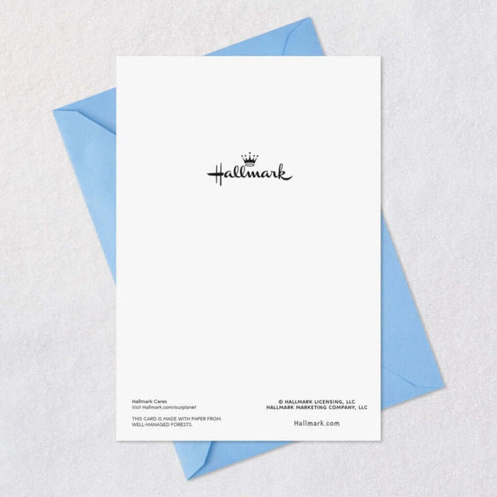 Hallmark card with blue envelope on a textured white background