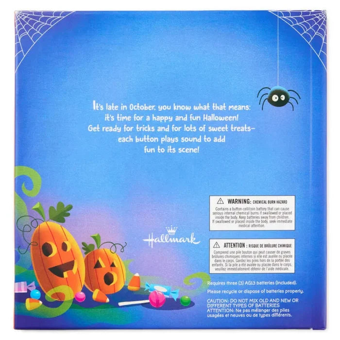 Hallmark Halloween Trick or treat book for kids, hard cover has has pumpkins and candy on a blue background, on a white background.