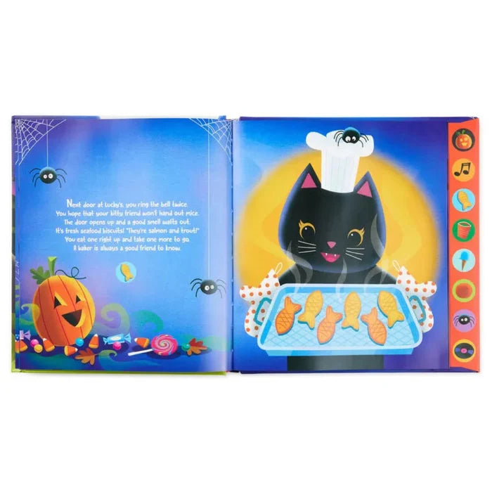 Open book with Halloween-themed illustrations of a black cat, pumpkin, and baked fish.