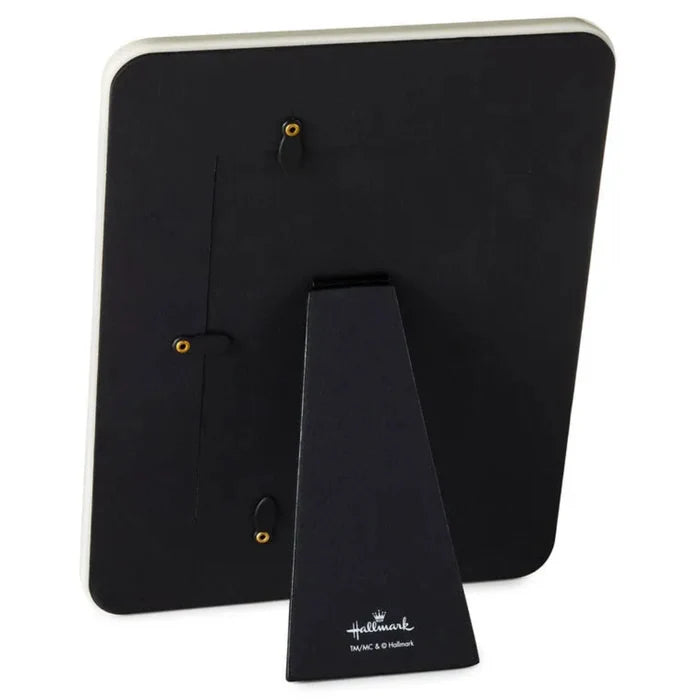 Black backside of a picture frame on a white background