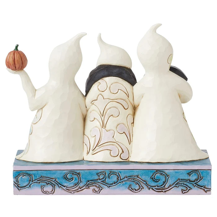 Back view of Jim Shore Ghosts with Boo figurine showcasing intricate swirl patterns on the ghosts’ robes.