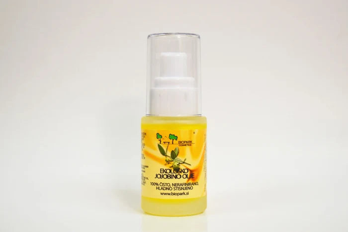 Bottle of biological olive oil on a white background