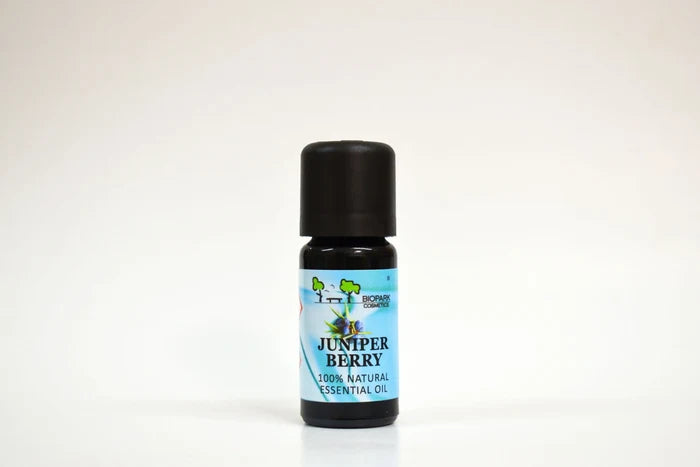 Bottle of Juniper Berry essential oil on a white background