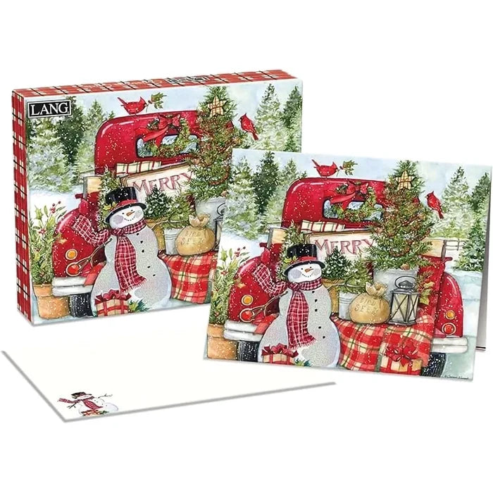 Set of Christmas cards showcasing cozy winter scene with red truck, snowman, and snowy landscape by Susan Winget