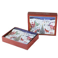 Christmas-themed gift box with festive design on a wooden surface with pine cones and greenery.