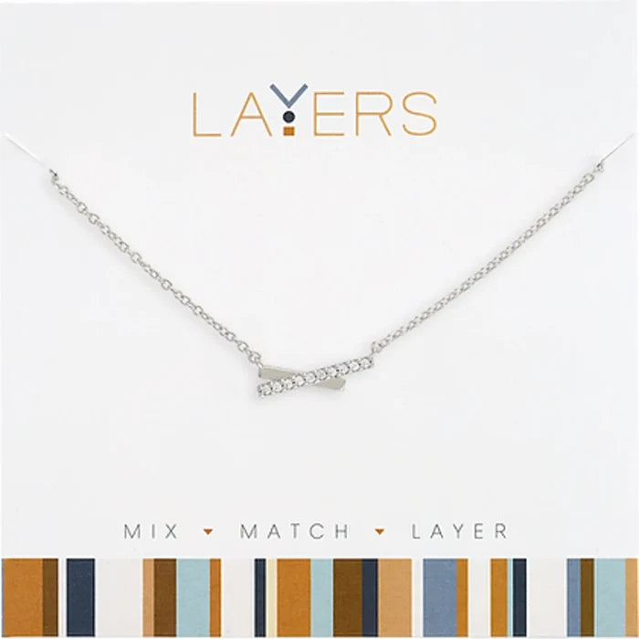 A silver chain necklace featuring a sleek silver pendant, elegantly designed for a modern look.