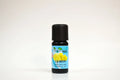 Bottle of lemon essential oil with a black cap on a white background