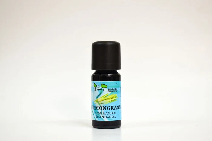Lemongrass essential oil bottle on a white background