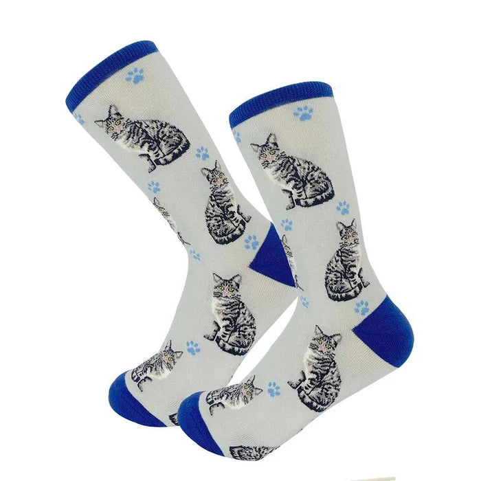 Knee-high socks with cat pattern and blue accents on a white background