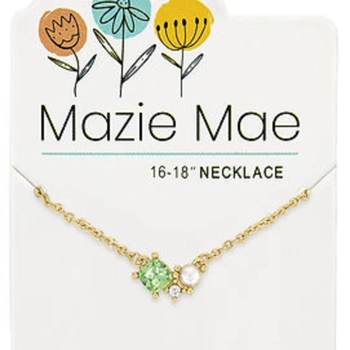 Stunning Maze Mae necklace with a central green crystal and delicate diamond embellishments.