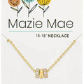 A close-up of the Mazie Mae necklace featuring a stylish gold chain, highlighting its sophisticated appearance.