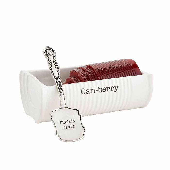 Mud Pie Can-Berry Dish Set featuring a white ceramic dish shaped like a tin can with “Can-berry” text and a silver server engraved with “Slice’n Serve,” holding sliced cranberry sauce.