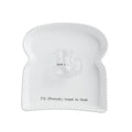 Mud Pie French Toast Platter set featuring toast-shaped ceramic plate with “I’ll (French) toast to that” text and glass syrup pitcher labeled “Stick to it.”