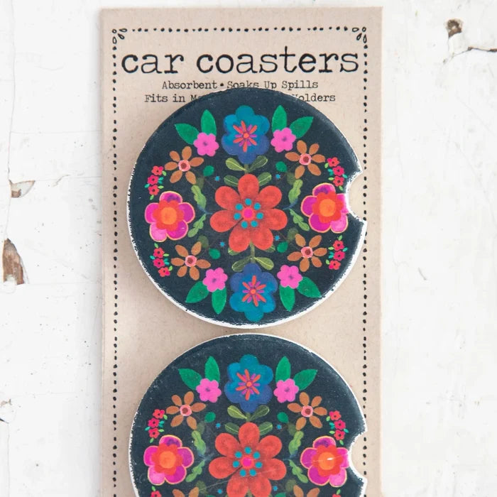 Two car magnets featuring vibrant floral designs in various colors and patterns.