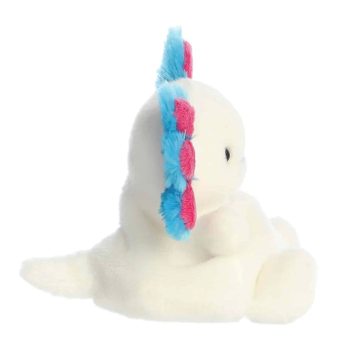 Side view of Palm Pals Fia Sheltie plush showing fluffy ears and compact size