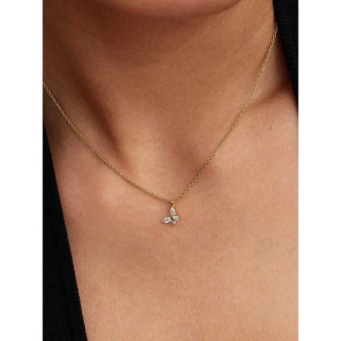 Pandora Butterfly Gold Pendant Necklace worn on model’s neck, showcasing gold chain and sparkling butterfly charm.