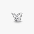 Silver butterfly-shaped earring on a white background