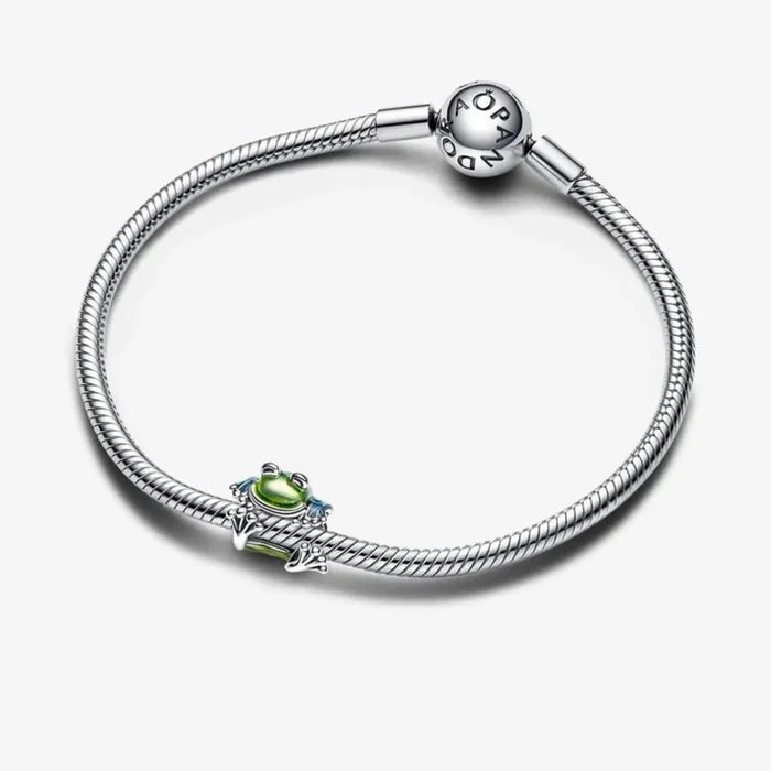 Pandora Climbing Frog Charm featuring a playful frog in a climbing pose.