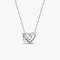 Silver necklace with a heart and butterfly shaped charm on a white background