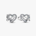 Silver earring with a heart and butterfly shaped charm on a white background
