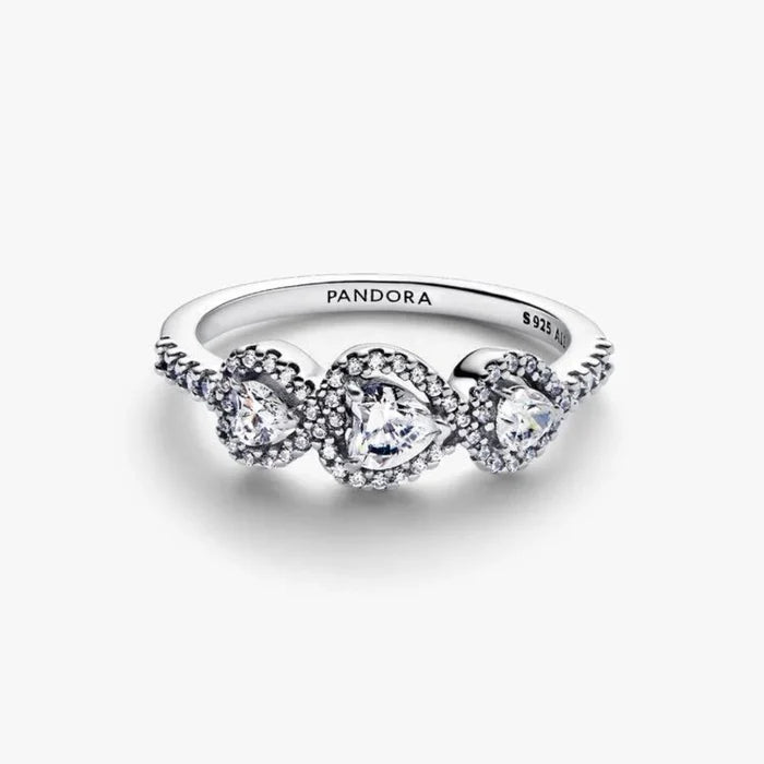 Pandora Halo Heart Trilogy Ring in sterling silver with heart-shaped halo stones.