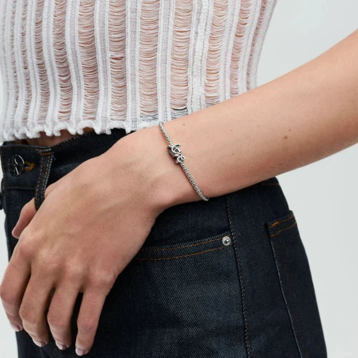 This Pandora Handwritten Love Charm adds a heartfelt touch to your personalized jewelry collection.