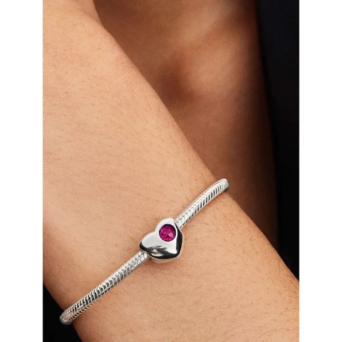 This Pandora July Engravable True Red Stone Heart Charm brings a vibrant and personal touch to your Pandora collection