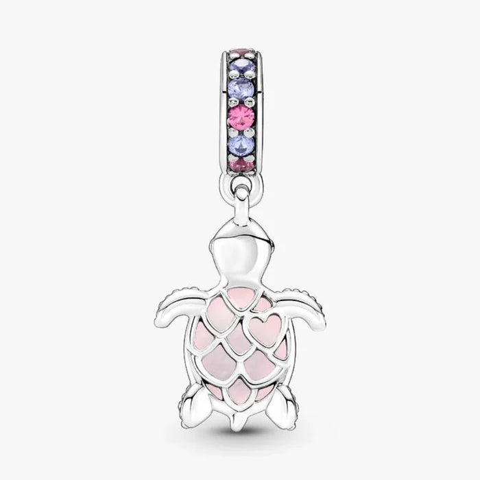 A charming pink turtle with purple stones, ideal for adding a whimsical touch to any jewelry collection.