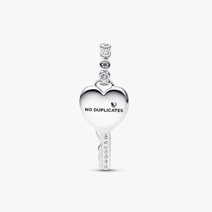 Silver pendant with 'NO DUPLICATES' text on a white background