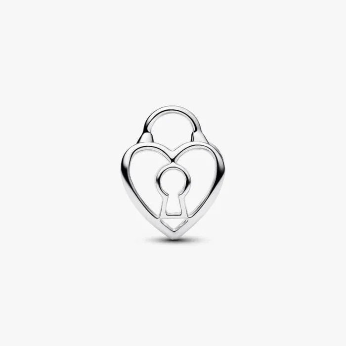 Silver heart-shaped charm with a keyhole on a white background