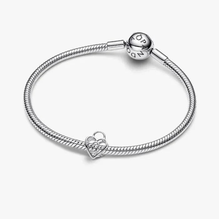 Silver bracelet with a heart-shaped clasp on a white background