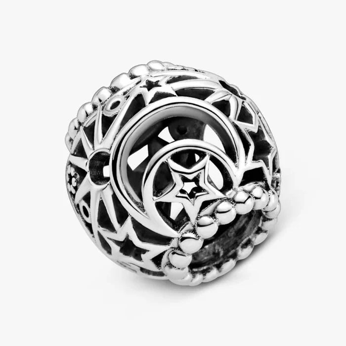 A silver ring featuring an intricate black and white design, showcasing a modern and elegant aesthetic.