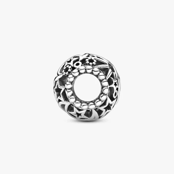 A sleek silver ring adorned with a striking black and white pattern, highlighting its contemporary style.