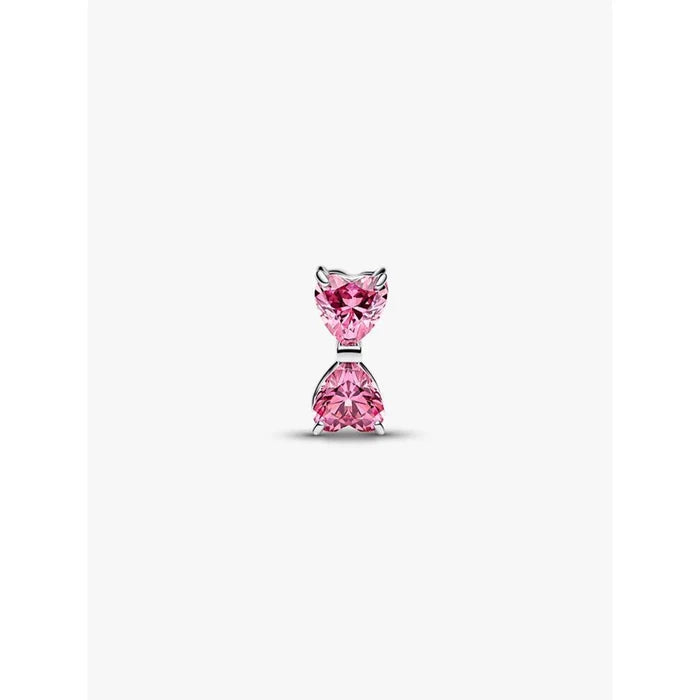 Front view of the Pandora Pink Bow Charm showcasing symmetrical pink heart-shaped stones.