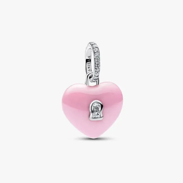 Pink heart-shaped charm with silver accents on a white background