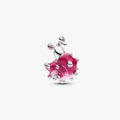 Silver charm with pink glass on a white background