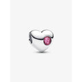 Sterling silver heart-shaped Pandora charm with a round pink stone detail on one side, displayed on a white background.