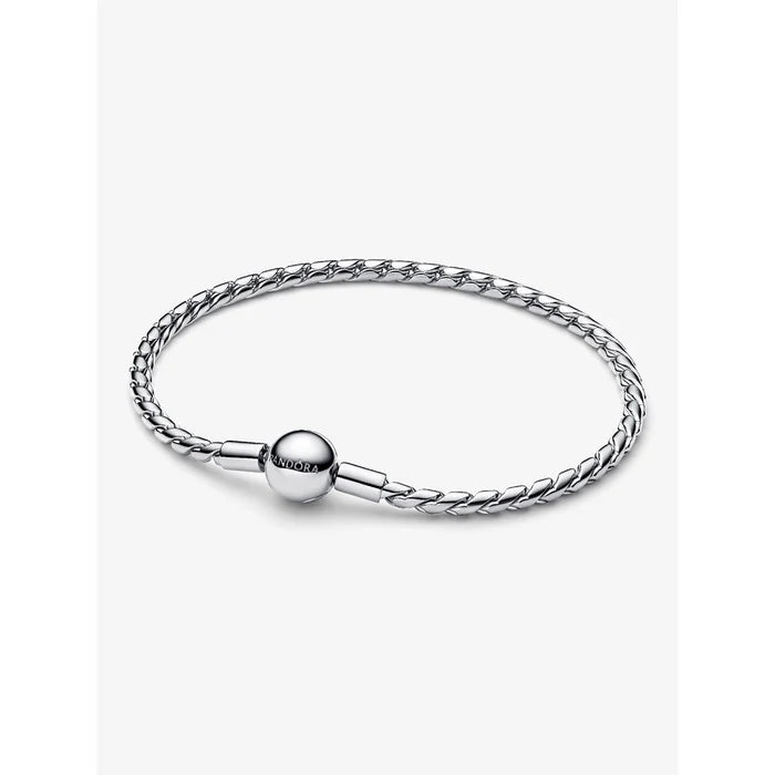 Pandora silver bracelet with engraved round clasp and woven chain, detailed product shot.
