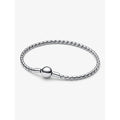 Pandora silver bracelet with engraved round clasp and woven chain, detailed product shot.
