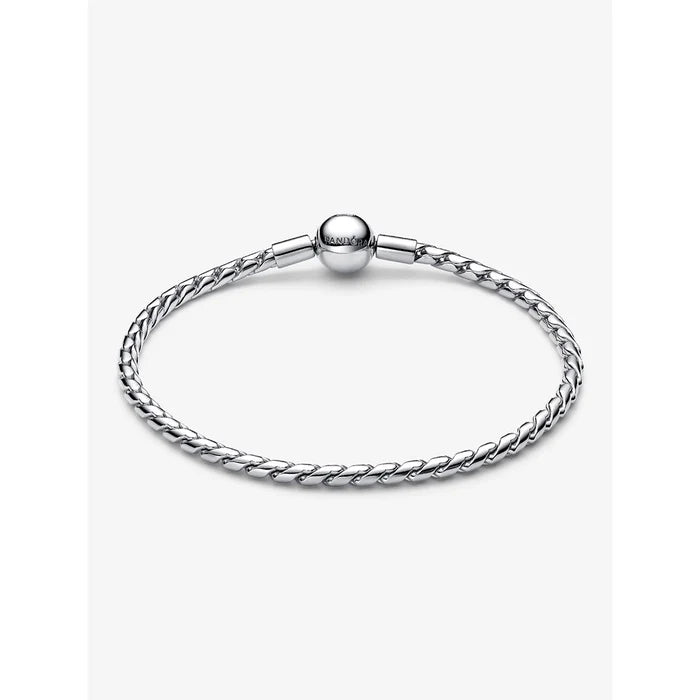 Pandora sterling silver woven bracelet with round clasp, classic jewelry design.