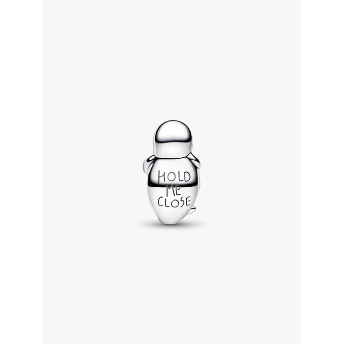 Back view of the Pandora Seal Charm showing the engraved message “Hold Me Close.