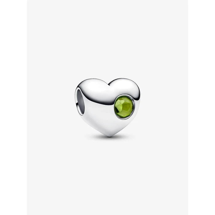 Close-up of the Pandora Spring Green Stone Heart Charm in sterling silver with a faceted green crystal centerpiece.