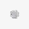 Silver four-leaf clover charm on a white background