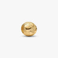 Gold  cylindrical globe  charm on a white background