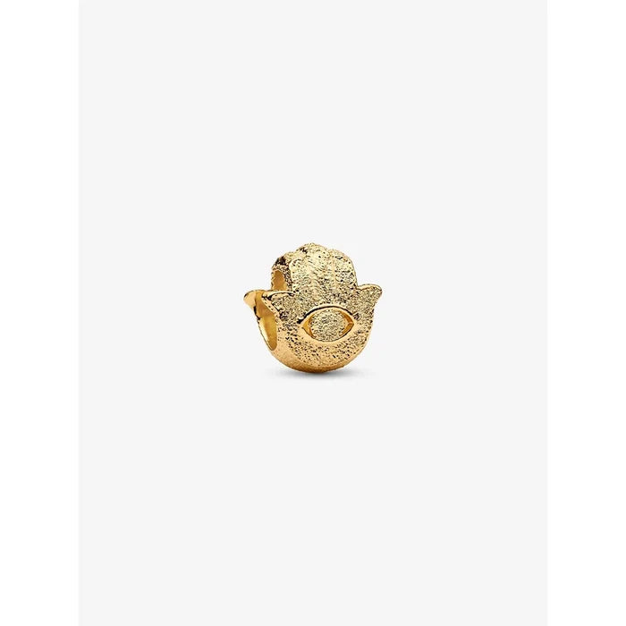 14k gold-plated Hamsa Hand charm with textured surface and cut-out eye detail.